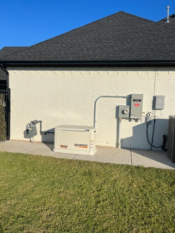 Residential backup generator installed outside home